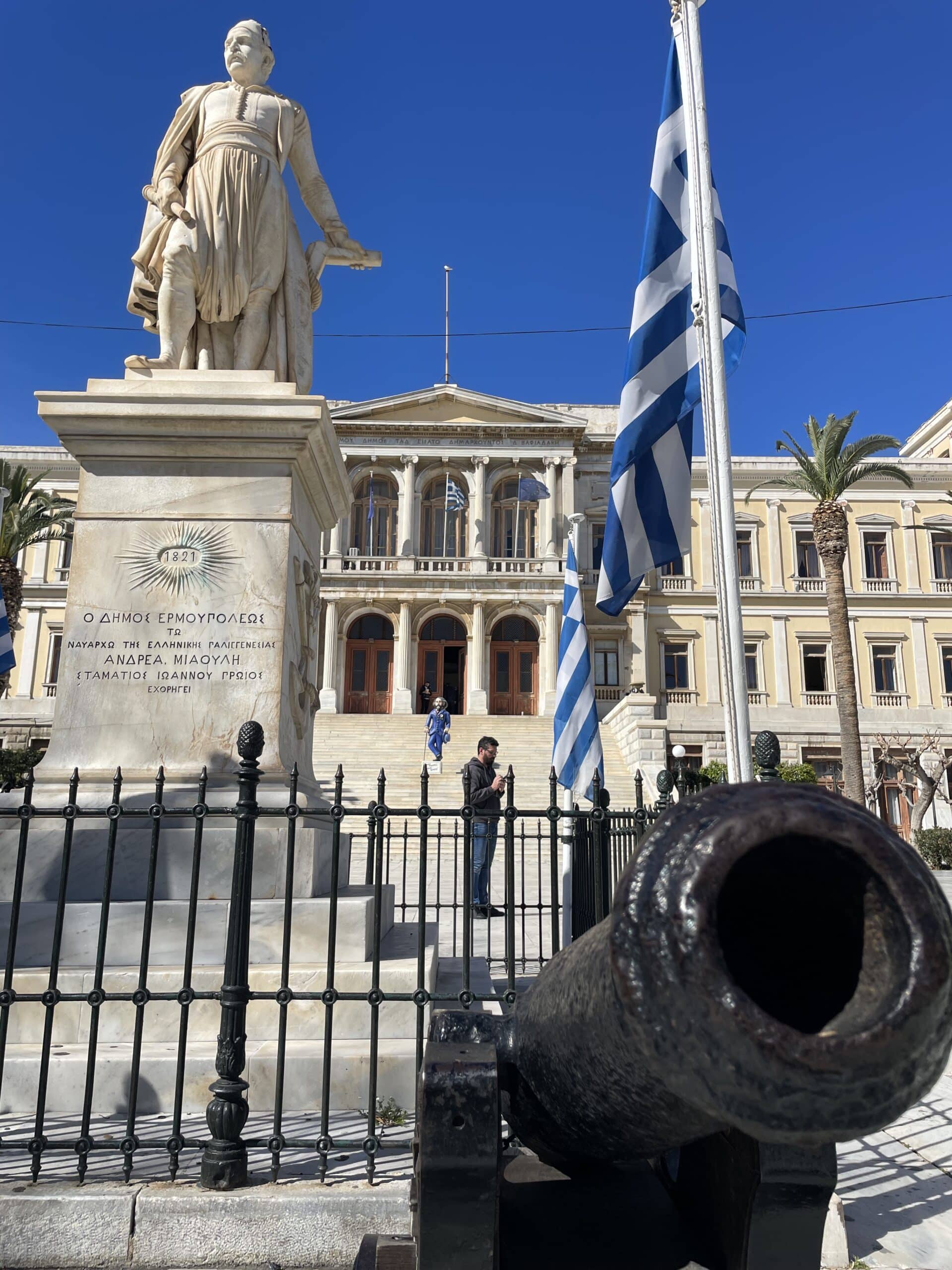 Syros main square with a statue in the front